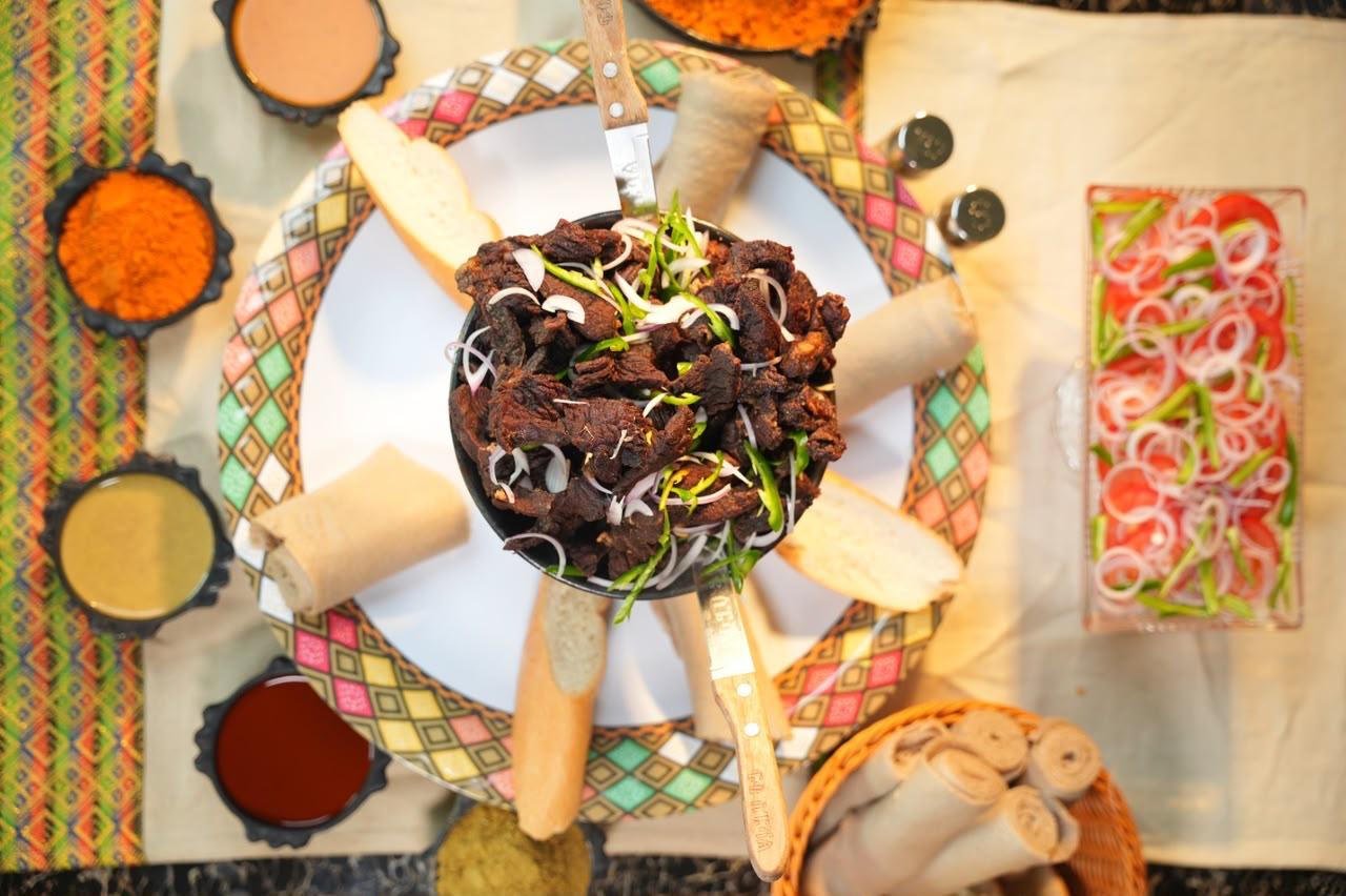 A full Ethiopian meal with many dishes and sauces