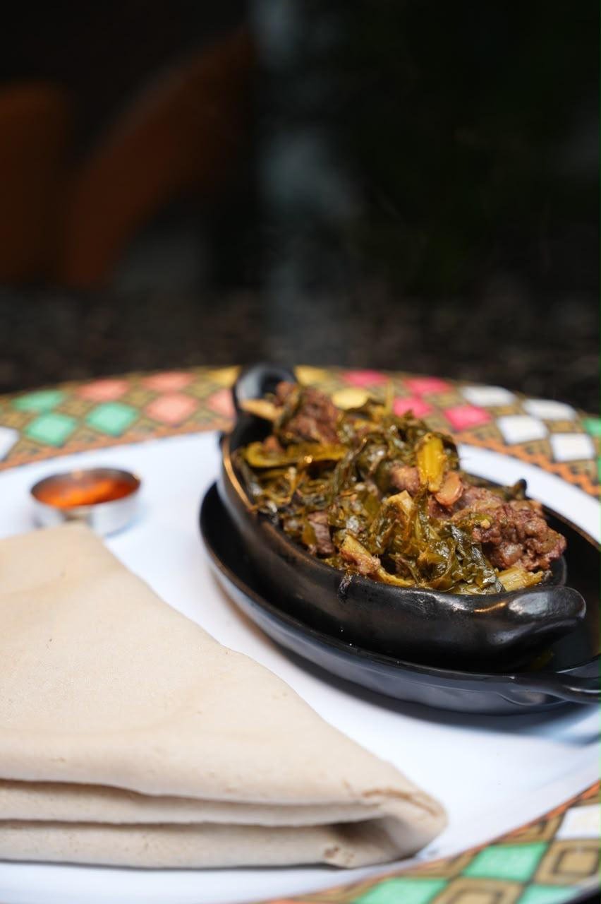 Warm Ethiopian dish served in a black pan